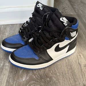 Nike Air Jordan High Tops in Black, Blue, and White